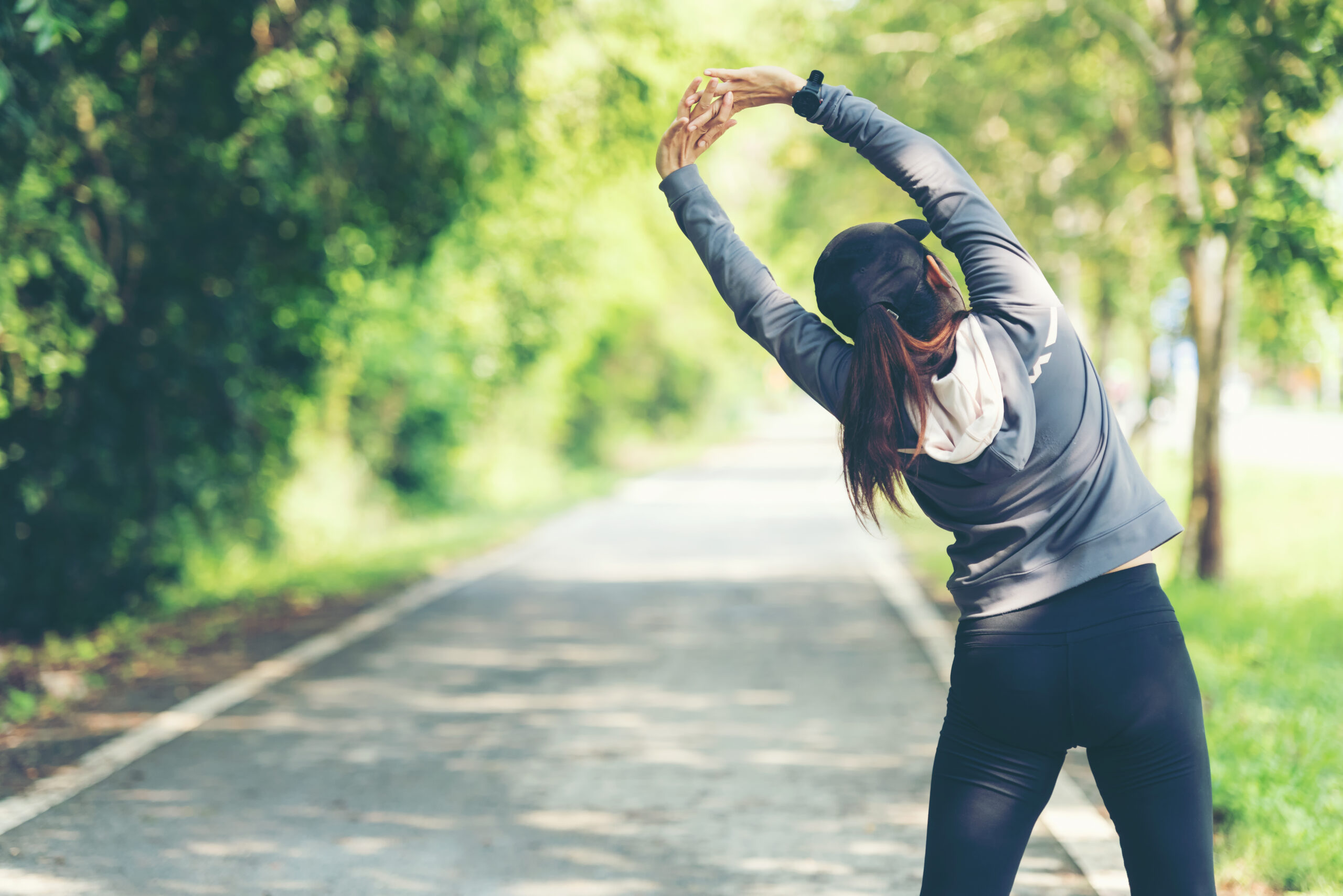 woman stretching outdoors